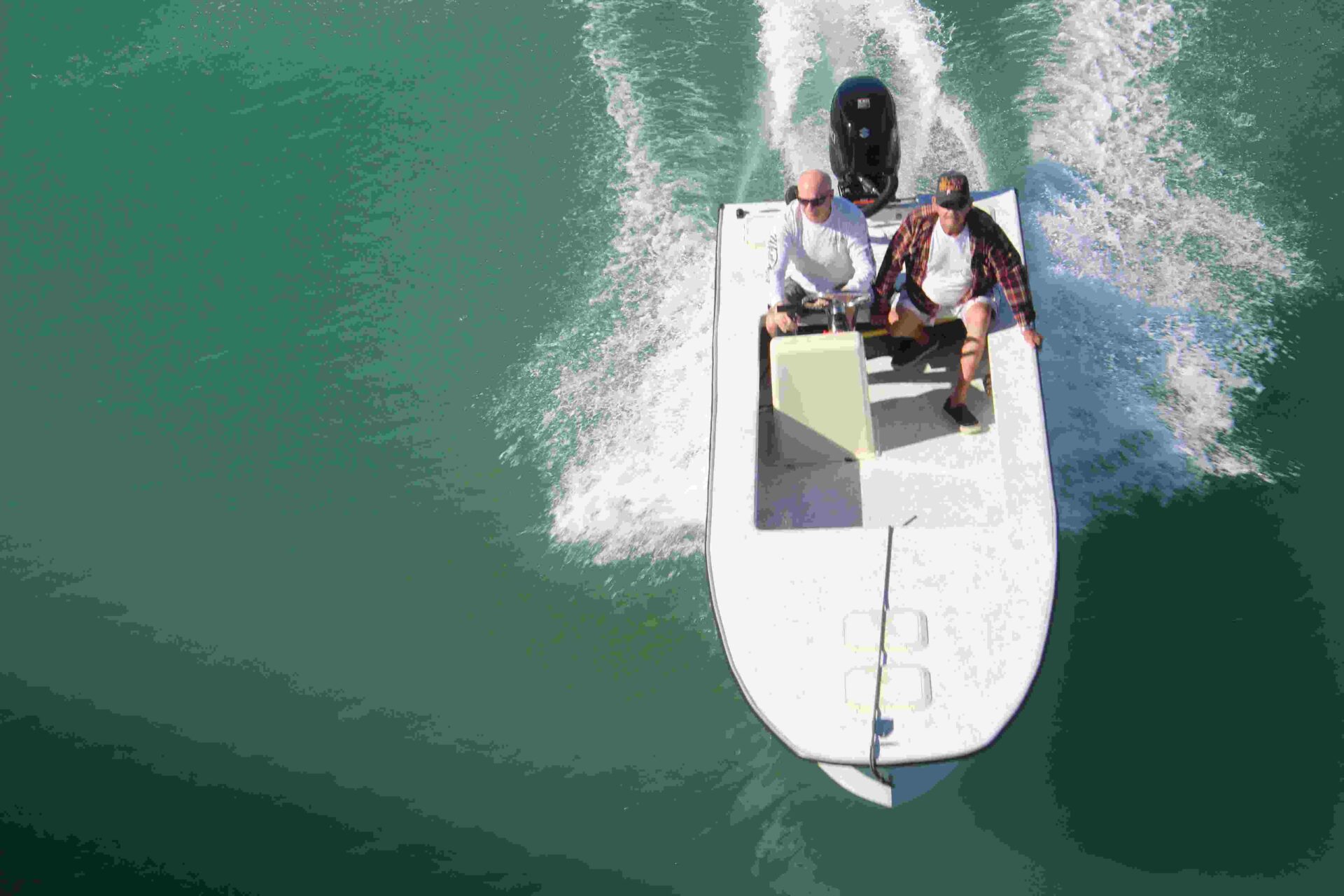 Top view of a boat with two men sitting in it